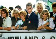 1 July 1990; The Republic of Ireland squad, including captain Mick McCarthy, are cheered by supporters as they are brought by open top bus from Dublin Airport to College Green in Dublin city centre on their arrival home for a homecoming reception after their participation in the 1990 FIFA World Cup Finals in Italy. Photo by Ray McManus/Sportsfile