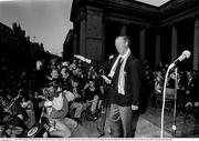 1 July 1990; Republic of Ireland manager Jack Charlton speaks to supporters during a homecoming reception on College Green in Dublin after their participation in the 1990 FIFA World Cup Finals in Italy. Photo by Ray McManus/Sportsfile