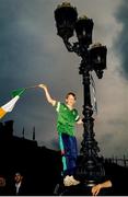 1 July 1990; Republic of Ireland supporters cheer on their team as they are brought by open top bus from Dublin Airport to College Green in Dublin city centre on their arrival home for a homecoming reception after their participation in the 1990 FIFA World Cup Finals in Italy. Photo by Ray McManus/Sportsfile