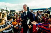 1 July 1990; Republic of Ireland manager Jack Charlton is greeted by young foorballers on his squad's arrival home for a homecoming reception after their participation in the 1990 FIFA World Cup Finals in Italy. Photo by Ray McManus/Sportsfile