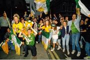 1 July 1990; Republic of Ireland supporters cheer on their team as they are brought by open top bus from Dublin Airport to College Green in Dublin city centre on their arrival home for a homecoming reception after their participation in the 1990 FIFA World Cup Finals in Italy. Photo by Ray McManus/Sportsfile