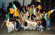 1 July 1990; Republic of Ireland supporters cheer on their team as they are brought by open top bus from Dublin Airport to College Green in Dublin city centre on their arrival home for a homecoming reception after their participation in the 1990 FIFA World Cup Finals in Italy. Photo by Ray McManus/Sportsfile