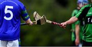 30 June 2020; Players tip hurls following the Junior B Hurling Challenge game between St Sylvester's and St Patrick's Donabate at Malahide Castle Pitches in Dublin. Photo by Piaras Ó Mídheach/Sportsfile