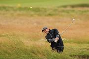 29 June 2020; Adam Cathers plays from a bunker onto the 12th green during the Flogas Irish Scratch Series at the Seapoint Golf Club in Termonfeckin, Louth. Photo by Matt Browne/Sportsfile