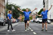 4 July 2020; Freeman of Dublin and former Dublin senior men's team manager Jim Gavin runs to the finish line held by Dublin footballer and secretary of The Dublin Neurological Institute Rebecca McDonnell and Professor Tim Lynch during the Dublin Neurological Institute 150km Frontline Run at Eccles Street in Dublin. The DNI is a registered charity where we care for patients with neurological diseases including Parkinson, Epilepsy, Motor Neuron Disease, Multiple Sclerosis, Headache, Stroke and many more is holding hold a fundraising run with staff members running this weekend to raise much needed funds. The goal is to run 150km between staff over the course of Saturday the 4th and Sunday the 5th of July. Donations can be made at https://tinyurl.com/yd3a4d8d . The run can be tracked using the free app 'Map My Run' and anyone who wishes to join in the run is very welcome. Photo by David Fitzgerald/Sportsfile