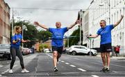 4 July 2020; Freeman of Dublin and former Dublin senior men's team manager Jim Gavin runs to the finish line held by Dublin footballer and secretary of The Dublin Neurological Institute Rebecca McDonnell and Professor Tim Lynch during the Dublin Neurological Institute 150km Frontline Run at Eccles Street in Dublin. The DNI is a registered charity where we care for patients with neurological diseases including Parkinson, Epilepsy, Motor Neuron Disease, Multiple Sclerosis, Headache, Stroke and many more is holding hold a fundraising run with staff members running this weekend to raise much needed funds. The goal is to run 150km between staff over the course of Saturday the 4th and Sunday the 5th of July. Donations can be made at https://tinyurl.com/yd3a4d8d . The run can be tracked using the free app 'Map My Run' and anyone who wishes to join in the run is very welcome. Photo by David Fitzgerald/Sportsfile