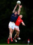 9 July 2020; Nathan Doran of Clontarf contests a high ball with Conor Grimes of Fingallians during the Senior Football Club Challenge match between Fingallians and Clontarf at Lawless Memorial Park in Swords, Dublin. Photo by Stephen McCarthy/Sportsfile
