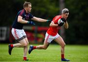 9 July 2020; Patrick O'Neill of Fingallians in action against Morgan Walsh of Clontarf during the Senior Football Club Challenge match between Fingallians and Clontarf at Lawless Memorial Park in Swords, Dublin. Photo by Stephen McCarthy/Sportsfile