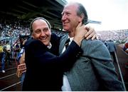 12 June 1988; Republic of Ireland manager Jack Charlton, right, and assistant manager Maurice Setters celebrate at the final whistle of the UEFA European Football Championship Finals Group B match between England and Republic of Ireland at Neckarstadion in Stuttgart, Germany. Photo by Ray McManus/Sportsfile