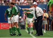 18 June 1994; Republic of Ireland manager Jack Charlton splashes water on Tommy Coyne, 15, and Andy Townsend during the FIFA World Cup 1994 Group E match between Republic of Ireland and Italy at Giants Stadium in New Jersey, USA. Photo by Ray McManus/Sportsfile