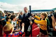 1 July 1990; Republic of Ireland manager Jack Charlton is greeted by young footballers on his squad's arrival home for a homecoming reception after their participation in the 1990 FIFA World Cup Finals in Italy. Photo by Ray McManus/Sportsfile