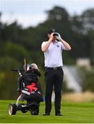 13 July 2020; Ruairi O'Connor uses his rangefinder on the 5th hole during the Flogas Irish Scratch Series at The K Club in Straffan, Kildare. Photo by Ramsey Cardy/Sportsfile