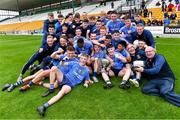 17 July 2020; St Joseph's players and coaches celebrate with the cup after the Leinster GAA Colleges Senior A Football Final match between Naas CBS and St Joseph's SS, Rochfortbridge at Bord na Móna O'Connor Park in Tullamore, Offaly. Competitive GAA matches have been approved to return following the guidelines of Phase 3 of the Irish Government’s Roadmap for Reopening of Society and Business and protocols set down by the GAA governing authorities. With games having been suspended since March, competitive games can take place with updated protocols including a limit of 200 individuals at any one outdoor event, including players, officials and a limited number of spectators, with social distancing, hand sanitisation and face masks being worn by those in attendance among other measures in an effort to contain the spread of the Coronavirus (COVID-19) pandemic. Photo by Piaras Ó Mídheach/Sportsfile
