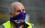 17 July 2020; Steward Larry Flood wears a Wexford GAA branded facemask during the Wexford County Senior Hurling Championship Group A Round 1 match between Oulart the Ballagh and St Martin's at Chadwicks Wexford Park in Wexford. Competitive GAA matches have been approved to return following the guidelines of Phase 3 of the Irish Government’s Roadmap for Reopening of Society and Business and protocols set down by the GAA governing authorities. With games having been suspended since March, competitive games can take place with updated protocols including a limit of 200 individuals at any one outdoor event, including players, officials and a limited number of spectators, with social distancing, hand sanitisation and face masks being worn by those in attendance among other measures in an effort to contain the spread of the Coronavirus (COVID-19) pandemic. Photo by Brendan Moran/Sportsfile