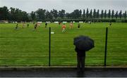 17 July 2020; A spectator watches on from outside the ground during the 2020 Down GAA ACFL Division 4B match between St Michael's and East Belfast at St Michael's GAA Ground in Magheralin, Down. Competitive GAA matches have been approved to return following the guidelines of Northern Ireland’s COVID-19 recovery plan and protocols set down by the GAA governing authorities. With games having been suspended since March, competitive games can take place with updated protocols with only players, officials and essential personnel permitted to attend, social distancing, hand sanitisation and face masks being worn by those in attendance in an effort to contain the spread of the Coronavirus (COVID-19) pandemic. Photo by David Fitzgerald/Sportsfile