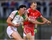 17 July 2020; Padraig O'Toole of Kiltegan in action against Paddy O'Rourke of Tinahely during the Wicklow County Senior Football Championship Round 1 match between Tinahely and Kiltegan at Baltinglass GAA Club in Baltinglass, Wicklow. Competitive GAA matches have been approved to return following the guidelines of Phase 3 of the Irish Government’s Roadmap for Reopening of Society and Business and protocols set down by the GAA governing authorities. With games having been suspended since March, competitive games can take place with updated protocols including a limit of 200 individuals at any one outdoor event, including players, officials and a limited number of spectators, with social distancing, hand sanitisation and face masks being worn by those in attendance among other measures in an effort to contain the spread of the Coronavirus (COVID-19) pandemic. Photo by Matt Browne/Sportsfile