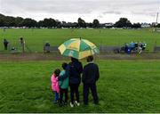 17 July 2020; The Moore family, from Mooretown, Ratoath, watch the action during the Meath County Senior Football League Division 1 Group C Round 1 match between Ratoath and Syddan at Sean Eiffe Park in Ratoath, Meath. Competitive GAA matches have been approved to return following the guidelines of Phase 3 of the Irish Government’s Roadmap for Reopening of Society and Business and protocols set down by the GAA governing authorities. With games having been suspended since March, competitive games can take place with updated protocols including a limit of 200 individuals at any one outdoor event, including players, officials and a limited number of spectators, with social distancing, hand sanitisation and face masks being worn by those in attendance among other measures in an effort to contain the spread of the Coronavirus (COVID-19) pandemic. Photo by Seb Daly/Sportsfile