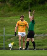 17 July 2020; Stephen McConville of Clonduff is shown a black card by referee Brendan Rice during the Down County Senior Football League Division 1A match between Clonduff and Kilcoo at Clonduff Park in Newry, Down. Competitive GAA matches have been approved to return following the guidelines of Northern Ireland’s COVID-19 recovery plan and protocols set down by the GAA governing authorities. With games having been suspended since March, competitive games can take place with updated protocols with only players, officials and essential personnel permitted to attend, social distancing, hand sanitisation and face masks being worn by those in attendance in an effort to contain the spread of the Coronavirus (COVID-19) pandemic. Photo by Sam Barnes/Sportsfile