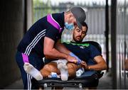 18 July 2020; Kevin Ryan of Rapparees-Starlights receives treatment from physio Joe Cullen ahead of the Wexford County Senior Hurling Championship Group D Round 1 match between Rapparees-Starlights and Shelmaliers at Chadwicks Wexford Park in Wexford. Competitive GAA matches have been approved to return following the guidelines of Phase 3 of the Irish Government’s Roadmap for Reopening of Society and Business and protocols set down by the GAA governing authorities. With games having been suspended since March, competitive games can take place with updated protocols including a limit of 200 individuals at any one outdoor event, including players, officials and a limited number of spectators, with social distancing, hand sanitisation and face masks being worn by those in attendance among other measures in an effort to contain the spread of the Coronavirus (COVID-19) pandemic. Photo by Sam Barnes/Sportsfile