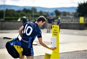 18 July 2020; Shane O'Brien of St Judes sanitizes as he arrives prior to the Dublin County Senior Hurling Championship Group 3 Round 1 match between Faughs and St Jude's at O'Toole Park in Dublin. Competitive GAA matches have been approved to return following the guidelines of Phase 3 of the Irish Government’s Roadmap for Reopening of Society and Business and protocols set down by the GAA governing authorities. With games having been suspended since March, competitive games can take place with updated protocols including a limit of 200 individuals at any one outdoor event, including players, officials and a limited number of spectators, with social distancing, hand sanitisation and face masks being worn by those in attendance among other measures in an effort to contain the spread of the Coronavirus (COVID-19) pandemic. Photo by David Fitzgerald/Sportsfile