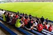 18 July 2020; Rapparees-Starlights manager Adrian Fenlon, right of centre, gives a half time team-talk in the stands during the Wexford County Senior Hurling Championship Group D Round 1 match between Rapparees-Starlights and Shelmaliers at Chadwicks Wexford Park in Wexford. Competitive GAA matches have been approved to return following the guidelines of Phase 3 of the Irish Government’s Roadmap for Reopening of Society and Business and protocols set down by the GAA governing authorities. With games having been suspended since March, competitive games can take place with updated protocols including a limit of 200 individuals at any one outdoor event, including players, officials and a limited number of spectators, with social distancing, hand sanitisation and face masks being worn by those in attendance among other measures in an effort to contain the spread of the Coronavirus (COVID-19) pandemic. Photo by Sam Barnes/Sportsfile