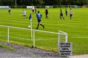 18 July 2020; A pitch closure sign sits next to the pitch during the Leinster Senior League Division 3A match between St. Mochta's FC and Spartak Dynamo FC at Porterstown Park in Dublin. Photo by Ramsey Cardy/Sportsfile