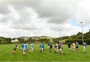 18 July 2020; Kilcar players warm-up prior to the Donegal County Divisional League Division 1 Section B match between Kilcar and Killybegs at Towney Park in Kilcar, Donegal. Competitive GAA matches have been approved to return following the guidelines of Phase 3 of the Irish Government’s Roadmap for Reopening of Society and Business and protocols set down by the GAA governing authorities. With games having been suspended since March, competitive games can take place with updated protocols including a limit of 200 individuals at any one outdoor event, including players, officials and a limited number of spectators, with social distancing, hand sanitisation and face masks being worn by those in attendance among other measures in an effort to contain the spread of the Coronavirus (COVID-19) pandemic. Photo by Seb Daly/Sportsfile