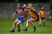 18 July 2020; Jody Ryan of Scoil Ui Chonail in action against Gary Kelly of Craobh Chiarain during the Dublin County Senior Hurling Championship Group 2 Round 1 match between Craobh Chiarain and Scoil Ui Chonaill GAA at O'Toole Park in Dublin. Competitive GAA matches have been approved to return following the guidelines of Phase 3 of the Irish Government’s Roadmap for Reopening of Society and Business and protocols set down by the GAA governing authorities. With games having been suspended since March, competitive games can take place with updated protocols including a limit of 200 individuals at any one outdoor event, including players, officials and a limited number of spectators, with social distancing, hand sanitisation and face masks being worn by those in attendance among other measures in an effort to contain the spread of the Coronavirus (COVID-19) pandemic. Photo by David Fitzgerald/Sportsfile