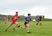 18 July 2020; Andrew McClean of Kilcar in action against Ciaran Conaghan of Killybegs during the Donegal County Divisional League Division 1 Section B match between Kilcar and Killybegs at Towney Park in Kilcar, Donegal. Competitive GAA matches have been approved to return following the guidelines of Phase 3 of the Irish Government’s Roadmap for Reopening of Society and Business and protocols set down by the GAA governing authorities. With games having been suspended since March, competitive games can take place with updated protocols including a limit of 200 individuals at any one outdoor event, including players, officials and a limited number of spectators, with social distancing, hand sanitisation and face masks being worn by those in attendance among other measures in an effort to contain the spread of the Coronavirus (COVID-19) pandemic. Photo by Seb Daly/Sportsfile