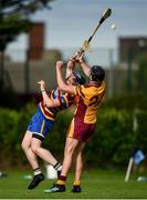 18 July 2020; Shane Sheridan of Scoil Ui Chonaill in action against Paul Pettigrew of Craobh Chiarain during the Dublin County Senior Hurling Championship Group 2 Round 1 match between Craobh Chiarain and Scoil Ui Chonaill GAA at O'Toole Park in Dublin. Competitive GAA matches have been approved to return following the guidelines of Phase 3 of the Irish Government’s Roadmap for Reopening of Society and Business and protocols set down by the GAA governing authorities. With games having been suspended since March, competitive games can take place with updated protocols including a limit of 200 individuals at any one outdoor event, including players, officials and a limited number of spectators, with social distancing, hand sanitisation and face masks being worn by those in attendance among other measures in an effort to contain the spread of the Coronavirus (COVID-19) pandemic. Photo by David Fitzgerald/Sportsfile