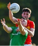 18 July 2020; Robert Holian of The Neale in action against Fergal Durkan of Castlebar Mitchels during the Michael Walsh Secondary Senior Football League Group 4 Round 1 match between The Neale and Castlebar Mitchels at Pairc Naomh Feichin in Cong, Mayo. Competitive GAA matches have been approved to return following the guidelines of Phase 3 of the Irish Government’s Roadmap for Reopening of Society and Business and protocols set down by the GAA governing authorities. With games having been suspended since March, competitive games can take place with updated protocols including a limit of 200 individuals at any one outdoor event, including players, officials and a limited number of spectators, with social distancing, hand sanitisation and face masks being worn by those in attendance among other measures in an effort to contain the spread of the Coronavirus (COVID-19) pandemic. Photo by Brendan Moran/Sportsfile