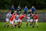 18 July 2020; Supporters watch on as Aidan O'Shea of Breaffy makes a break during the Michael Walsh Secondary Senior Football League match between Breaffy and Garrymore at Breaffy GAA Club in Mayo. Competitive GAA matches have been approved to return following the guidelines of Phase 3 of the Irish Government’s Roadmap for Reopening of Society and Business and protocols set down by the GAA governing authorities. With games having been suspended since March, competitive games can take place with updated protocols including a limit of 200 individuals at any one outdoor event, including players, officials and a limited number of spectators, with social distancing, hand sanitisation and face masks being worn by those in attendance among other measures in an effort to contain the spread of the Coronavirus (COVID-19) pandemic. Photo by Stephen McCarthy/Sportsfile