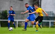 19 July 2020; Brandon Payne of Bluebell United in action against Jack Doyle of Ballymun United during the Leinster Senior League Senior Sunday Division match between Bluebell United and Ballymun United at Capco Park in Bluebell, Dublin.  Photo by Sam Barnes/Sportsfile