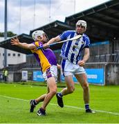 19 July 2020; Niall Ryan of Ballyboden St Enda's in action against Dillon Mulligan of Kilmacud Crokes during the Dublin County Senior Hurling Championship Round 1 match between Ballyboden St Enda's and Kilmacud Crokes at Parnell Park in Dublin. Competitive GAA matches have been approved to return following the guidelines of Phase 3 of the Irish Government’s Roadmap for Reopening of Society and Business and protocols set down by the GAA governing authorities. With games having been suspended since March, competitive games can take place with updated protocols including a limit of 200 individuals at any one outdoor event, including players, officials and a limited number of spectators, with social distancing, hand sanitisation and face masks being worn by those in attendance among other measures in an effort to contain the spread of the Coronavirus (COVID-19) pandemic. Photo by Ramsey Cardy/Sportsfile