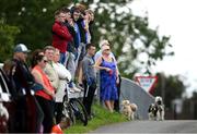 19 July 2020; Supporters watch on from outside the ground during the Armagh County Senior Football League Group A Round 1 match between Maghery Sean McDermotts and Crossmaglen Rangers at Felix Hamill Park in Maghery, Armagh. Competitive GAA matches have been approved to return following the guidelines of Northern Ireland’s COVID-19 recovery plan and protocols set down by the GAA governing authorities. With games having been suspended since March, competitive games can take place with updated protocols with only players, officials and essential personnel permitted to attend, social distancing, hand sanitisation and face masks being worn by those in attendance in an effort to contain the spread of the Coronavirus (COVID-19) pandemic. Photo by Stephen McCarthy/Sportsfile