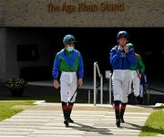 19 July 2020; Jockeys Declan McDonogh, left, and Kevin Manning make their way to the parade ring prior to the Kilboy Estate Stakes at The Curragh Racecourse in Kildare. Racing remains behind closed doors to the public under guidelines of the Irish Government in an effort to contain the spread of the Coronavirus (COVID-19) pandemic. Photo by Seb Daly/Sportsfile
