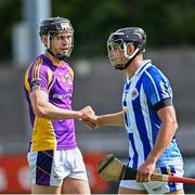 19 July 2020; Ronan Hayes of Kilmacud Crokes and Luke Corcoran of Ballyboden St Enda's following the Dublin County Senior Hurling Championship Round 1 match between Ballyboden St Enda's and Kilmacud Crokes at Parnell Park in Dublin. Competitive GAA matches have been approved to return following the guidelines of Phase 3 of the Irish Government’s Roadmap for Reopening of Society and Business and protocols set down by the GAA governing authorities. With games having been suspended since March, competitive games can take place with updated protocols including a limit of 200 individuals at any one outdoor event, including players, officials and a limited number of spectators, with social distancing, hand sanitisation and face masks being worn by those in attendance among other measures in an effort to contain the spread of the Coronavirus (COVID-19) pandemic. Photo by Ramsey Cardy/Sportsfile