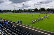 19 July 2020; Ballyboden St Enda's players warm-up ahead of the Dublin County Senior Hurling Championship Round 1 match between Ballyboden St Enda's and Kilmacud Crokes at Parnell Park in Dublin. Competitive GAA matches have been approved to return following the guidelines of Phase 3 of the Irish Government’s Roadmap for Reopening of Society and Business and protocols set down by the GAA governing authorities. With games having been suspended since March, competitive games can take place with updated protocols including a limit of 200 individuals at any one outdoor event, including players, officials and a limited number of spectators, with social distancing, hand sanitisation and face masks being worn by those in attendance among other measures in an effort to contain the spread of the Coronavirus (COVID-19) pandemic. Photo by Ramsey Cardy/Sportsfile