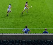 19 July 2020; Ronan Hayes of Kilmacud Crokes in action against James Madden, watched by Ballyboden St Enda's team-mate Kenny Wigglesworth, 20, during the Dublin County Senior Hurling Championship Round 1 match between Ballyboden St Enda's and Kilmacud Crokes at Parnell Park in Dublin. Competitive GAA matches have been approved to return following the guidelines of Phase 3 of the Irish Government’s Roadmap for Reopening of Society and Business and protocols set down by the GAA governing authorities. With games having been suspended since March, competitive games can take place with updated protocols including a limit of 200 individuals at any one outdoor event, including players, officials and a limited number of spectators, with social distancing, hand sanitisation and face masks being worn by those in attendance among other measures in an effort to contain the spread of the Coronavirus (COVID-19) pandemic. Photo by Ramsey Cardy/Sportsfile