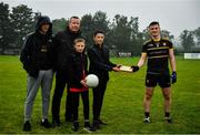17 July 2020; Members of the Down football league hand over a welcome to the league plaque to East Belfast captain Aaron McLaughlin prior to the 2020 Down GAA ACFL Division 4B match between St Michael's and East Belfast at St Michael's GAA Ground in Magheralin, Down. Competitive GAA matches have been approved to return following the guidelines of Northern Ireland’s COVID-19 recovery plan and protocols set down by the GAA governing authorities. With games having been suspended since March, competitive games can take place with updated protocols with only players, officials and essential personnel permitted to attend, social distancing, hand sanitisation and face masks being worn by those in attendance in an effort to contain the spread of the Coronavirus (COVID-19) pandemic. Photo by David Fitzgerald/Sportsfile