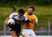 17 July 2020; Ryan Johnston of Kilcoo in action against Ruairí Lively of Clonduff during the Down County Senior Football League Division 1A match between Clonduff and Kilcoo at Clonduff Park in Newry, Down. Competitive GAA matches have been approved to return following the guidelines of Northern Ireland’s COVID-19 recovery plan and protocols set down by the GAA governing authorities. With games having been suspended since March, competitive games can take place with updated protocols with only players, officials and essential personnel permitted to attend, social distancing, hand sanitisation and face masks being worn by those in attendance in an effort to contain the spread of the Coronavirus (COVID-19) pandemic. Photo by Sam Barnes/Sportsfile