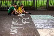 21 July 2020; Young residents at The Iveagh Trust Kevin Street in Dublin during a rememberance for Jack Charlton on the day of his funeral in Newcastle, England. The former Republic of Ireland manager Jack Charlton lead the Republic of Ireland team to their first major finals at UEFA Euro 1988, and subsequently the FIFA World Cup 1990, in Italy, and the FIFA World Cup 1994, in USA.  Photo by Stephen McCarthy/Sportsfile