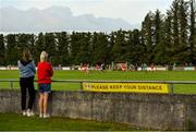 18 July 2020; Supporters watch the Michael Walsh Secondary Senior Football League Group 4 Round 1 match between The Neale and Castlebar Mitchels at Pairc Naomh Feichin in Cong, Mayo. Competitive GAA matches have been approved to return following the guidelines of Phase 3 of the Irish Government’s Roadmap for Reopening of Society and Business and protocols set down by the GAA governing authorities. With games having been suspended since March, competitive games can take place with updated protocols including a limit of 200 individuals at any one outdoor event, including players, officials and a limited number of spectators, with social distancing, hand sanitisation and face masks being worn by those in attendance among other measures in an effort to contain the spread of the Coronavirus (COVID-19) pandemic. Photo by Brendan Moran/Sportsfile