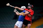 23 July 2020; David Connolly of Adare in action against Aaron Gillane of Patrickswell during the Limerick County Senior Hurling Championship Round 1 match between Patrickswell and Adare at LIT Gaelic Grounds in Limerick. Competitive GAA matches have been approved to return following the guidelines of Phase 3 of the Irish Government’s Roadmap for Reopening of Society and Business and protocols set down by the GAA governing authorities. With games having been suspended since March, competitive games can take place with updated protocols including a limit of 200 individuals at any one outdoor event, including players, officials and a limited number of spectators, with social distancing, hand sanitisation and face masks being worn by those in attendance among other measures in an effort to contain the spread of the Coronavirus (COVID-19). Photo by Sam Barnes/Sportsfile