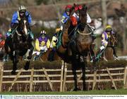 27 December 2003; Eimear's Pride, with Gareth Cotter up, red and white silks, jumps the last first time around with Dolmur, Patrick Gerard Murphy up, during the Paddy Power Festival 3-Y-O Hurdle, Leopardstown Racecourse, Dublin. Horse Racing. Picture Credit; Damien Eagers / SPORTSFILE *EDI*