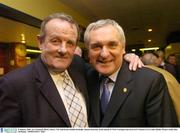 8 January 2004; An TAoiseach, Bertie Ahern, T.D. with former Dublin footballer Jimmy Keaveney at the launch of TG4's Laochga Gael series in St Vincent's GAA club, Dublin. Picture credit; Ray McManus / SPORTSFILE *EDI*