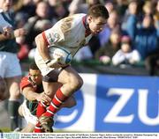 11 January 2004; Andy Ward, Ulster, goes past the tackle of Neil Baxter, Leicester Tigers, before scoring his second try. Heineken European Cup 2003-2004, Round 3, Pool 1, Ulster v Leicester Tigers, Ravenhill, Belfast. Picture credit; Matt Browne / SPORTSFILE *EDI*
