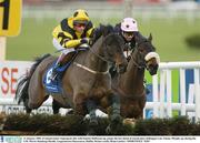 11 January 2004; Eventual winner Supergood, left, with Seamus Heffernan up, jumps the last ahead of second place Kilbeggan Lad, Timmy Murphy up, during the S.M. Morris Handicap Hurdle, Leopardstown Racecourse, Dublin. Picture credit; Brian Lawless / SPORTSFILE *EDI*