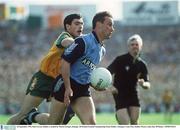 20 September 1992; Paul Curran, Dublin, is tackled by Martin Gavigan, Donegal. All Ireland Football Championship Final, Dublin v Donegal, Croke Park, Dublin. Picture credit; Ray McManus / SPORTSFILE