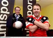 5 March 2003; Cork and Nemo Rangers footballer Colin Corkery with Dave McCarthy, Marketing manager, Lee Sports Distributors, and the new Uhlsport gaelic football gloves that Corkery helped design. Football. Picture credit; Brendan Moran / SPORTSFILE *EDI*